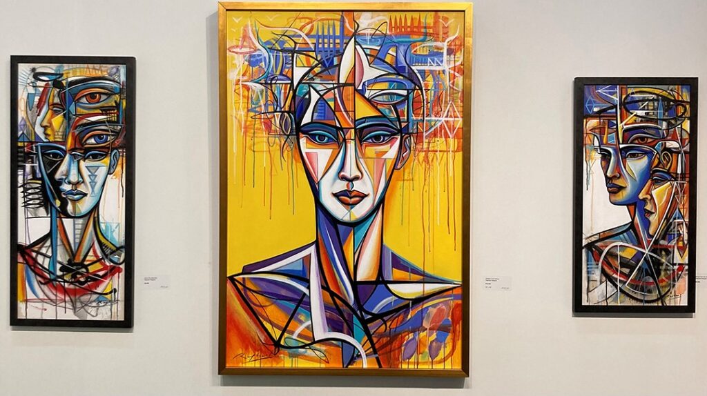 Signature style paintings exploring the human form and abstract designs from artist Raphael Delgado. 